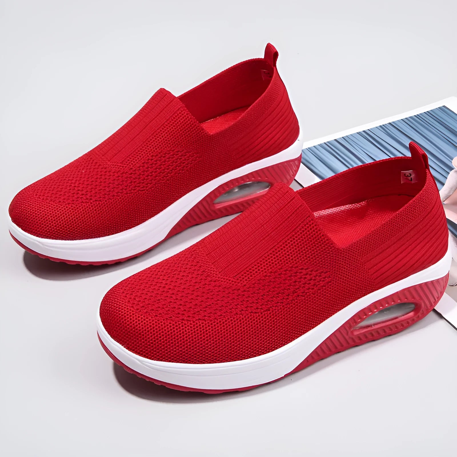 Women's mesh running shoes with air cushion midsole in beige colour showing round toe design