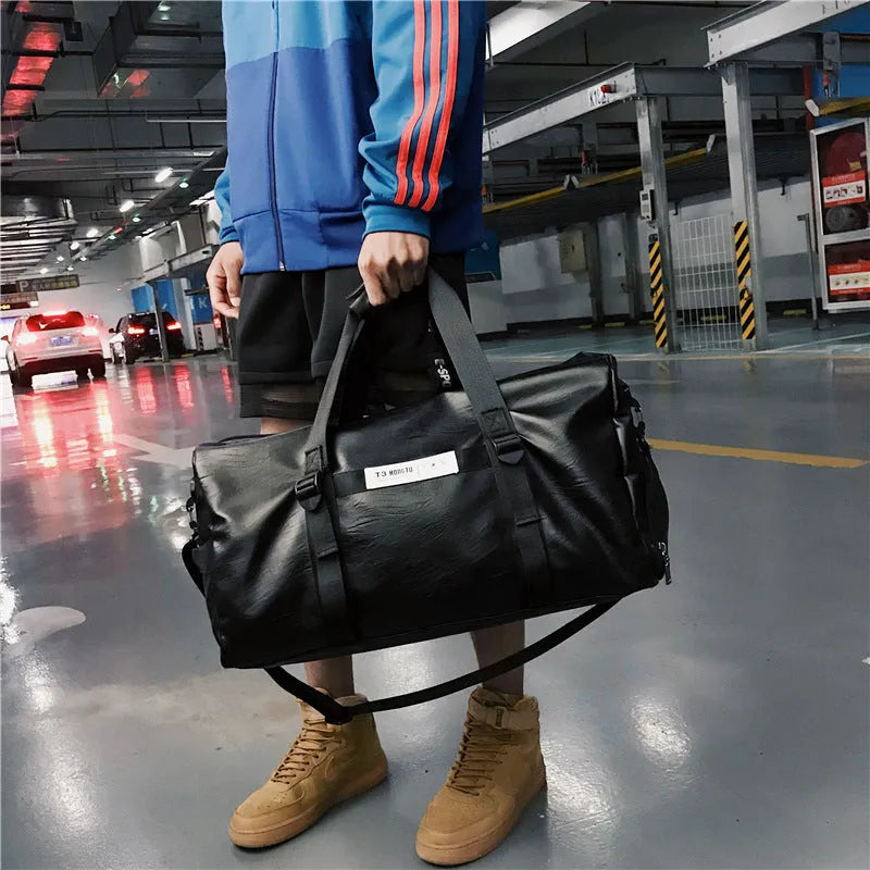 Black fabric portable travel bag shown in large 49cm and small 45cm sizes