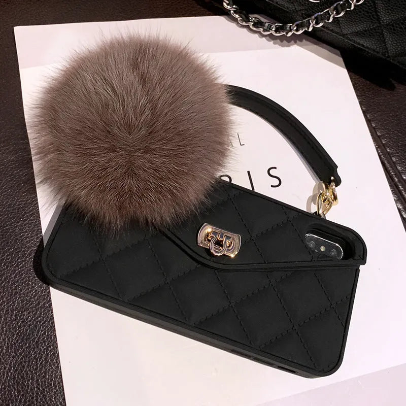 Hairball TPU phone case with plush detail in a dark green grid pattern on an iPhone.