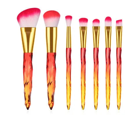 10 clear crystal handle foundation brushes with diamond shank design and black bristles.