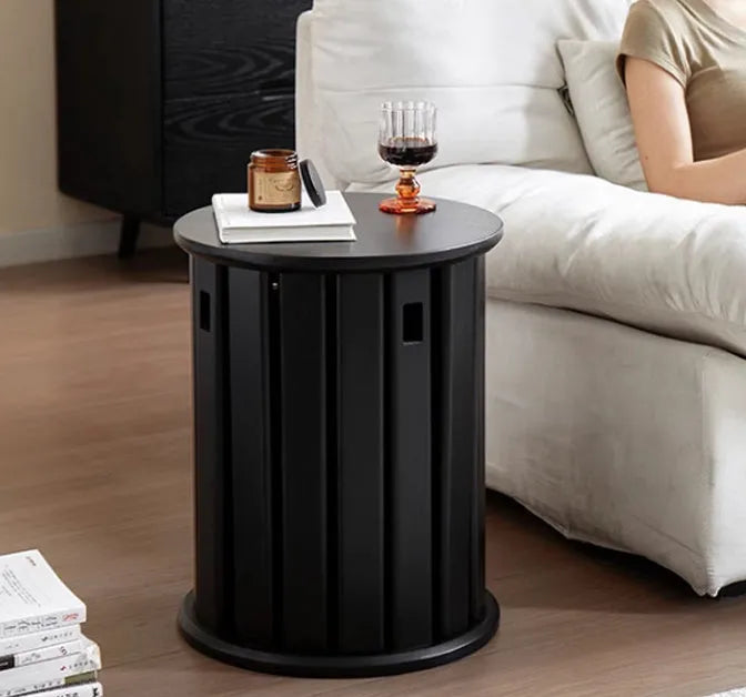 Stackable round iron dining stool in a modern style, shown in a choice of four colours.