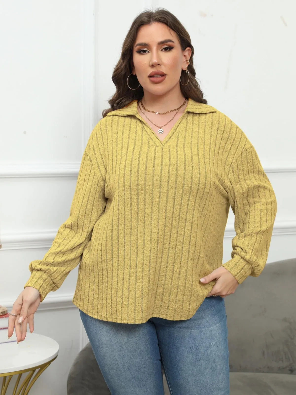 Women's plus size gray fleece pullover with polo collar and lantern sleeves