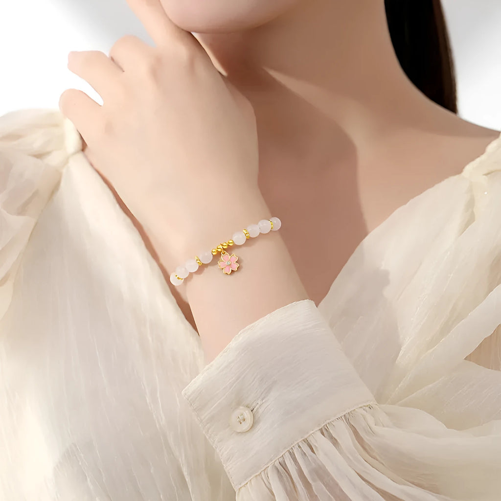 Pink gradient Hetian jade and 925 silver bracelet with epoxy cherry blossom pendant.