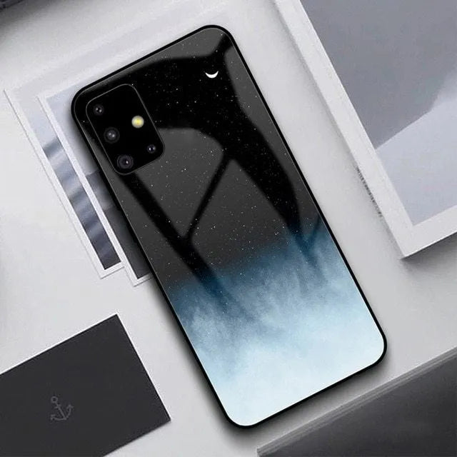 Simple black silicone phone case shown next to a navy blue version, for Samsung and iPhone models.