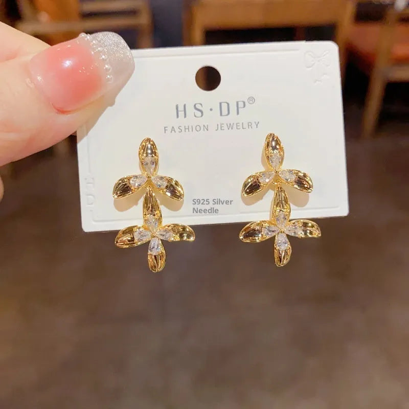 Women's real gold plated copper petal tassel earrings with metal diamond fringe in simple flower shape