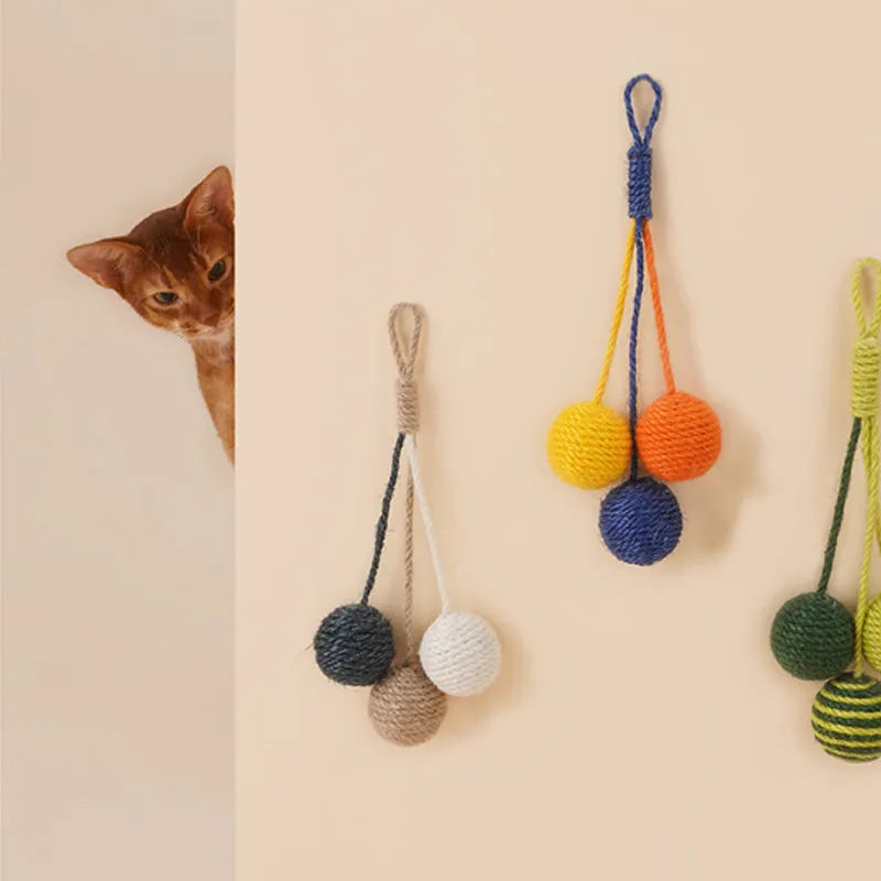 Four-piece cat toy set featuring a teaser stick and a catnip ball on a blue background