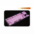 White transparent mechanical keyboard keycap set with side carving details on a black background.