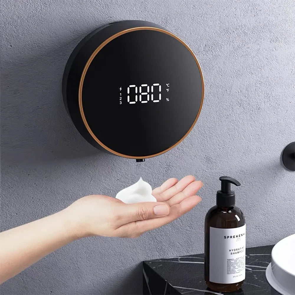 Black and white automatic wall-mounted foam soap dispenser with sensor and USB charging port.