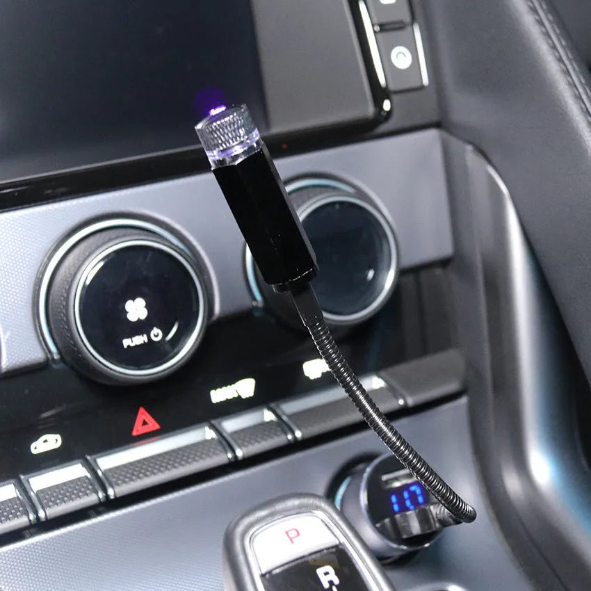 LED car roof star night lights projector showing purple star projection on car ceiling