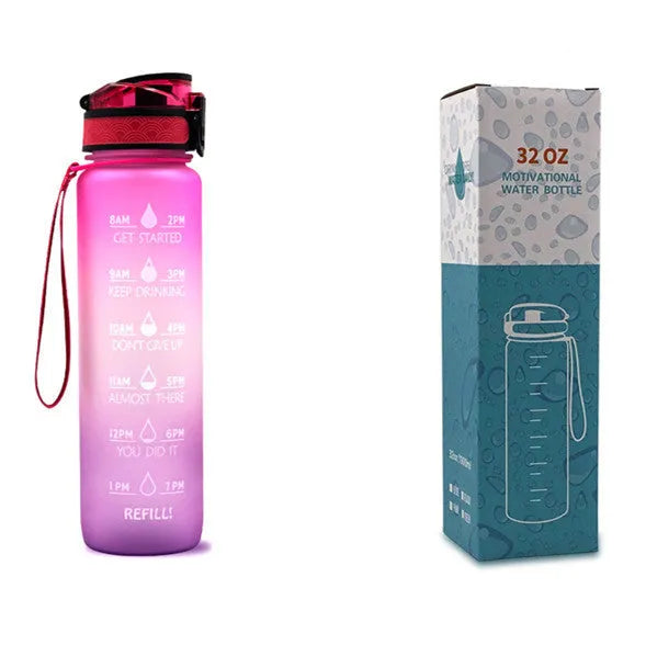 Blue and red gradient 1 litre Tritan sports water bottle with time markers and a black flip-top lid.
