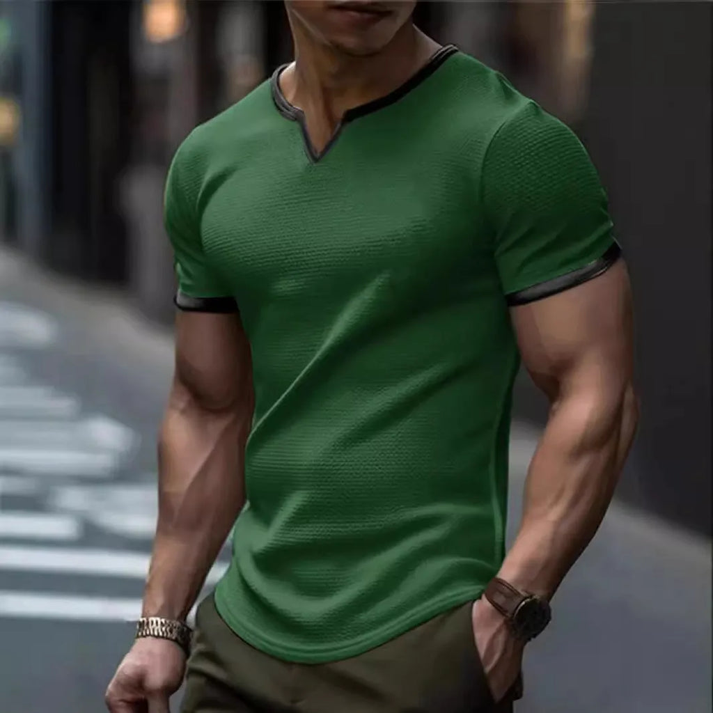 Men's colour-block V-neck short-sleeve sports T-shirt on a hanger, showing waffle texture and multiple colour options.