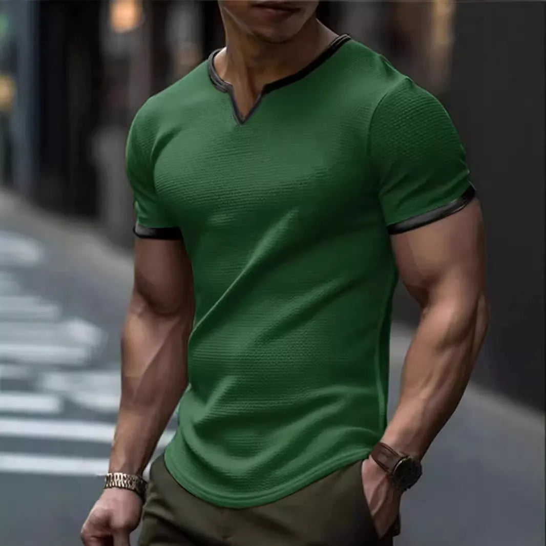 Men's colour-block V-neck short-sleeve sports T-shirt on a hanger, showing waffle texture and multiple colour options.