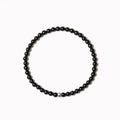 Unisex geometric agate bracelet with 4mm stones and adjustable clasp in black, blue, or obsidian.