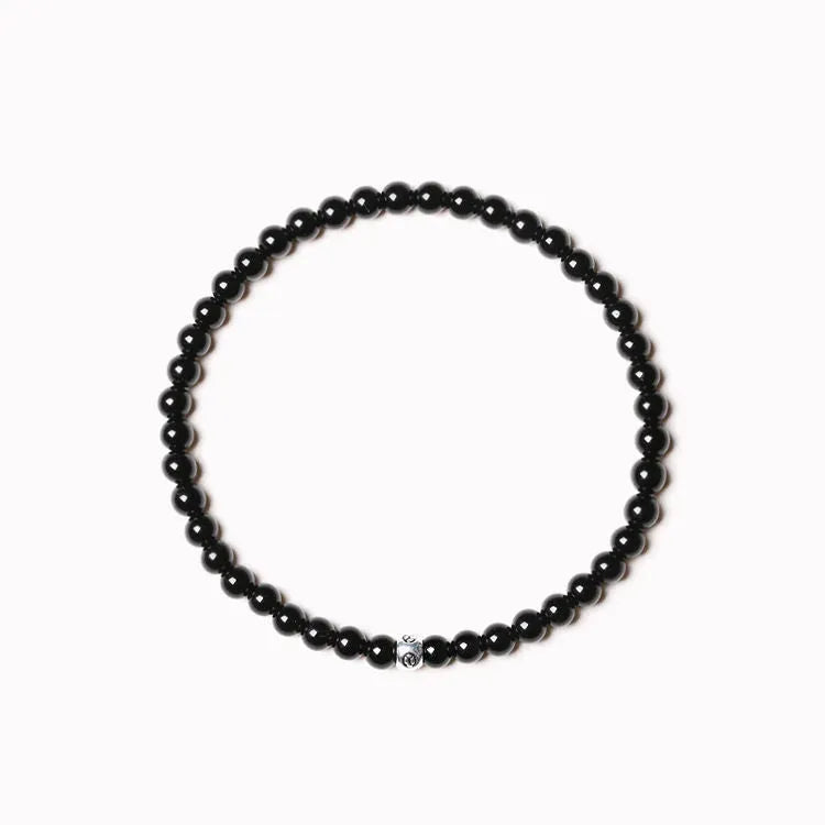 Unisex geometric agate bracelet with 4mm stones and adjustable clasp in black, blue, or obsidian.
