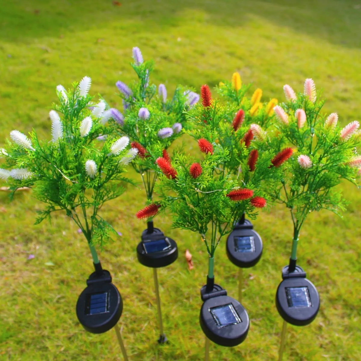 LED solar Christmas tree ground lamp with 15-color LED, 70cm tall, plastic and stainless steel construction, purple or red options