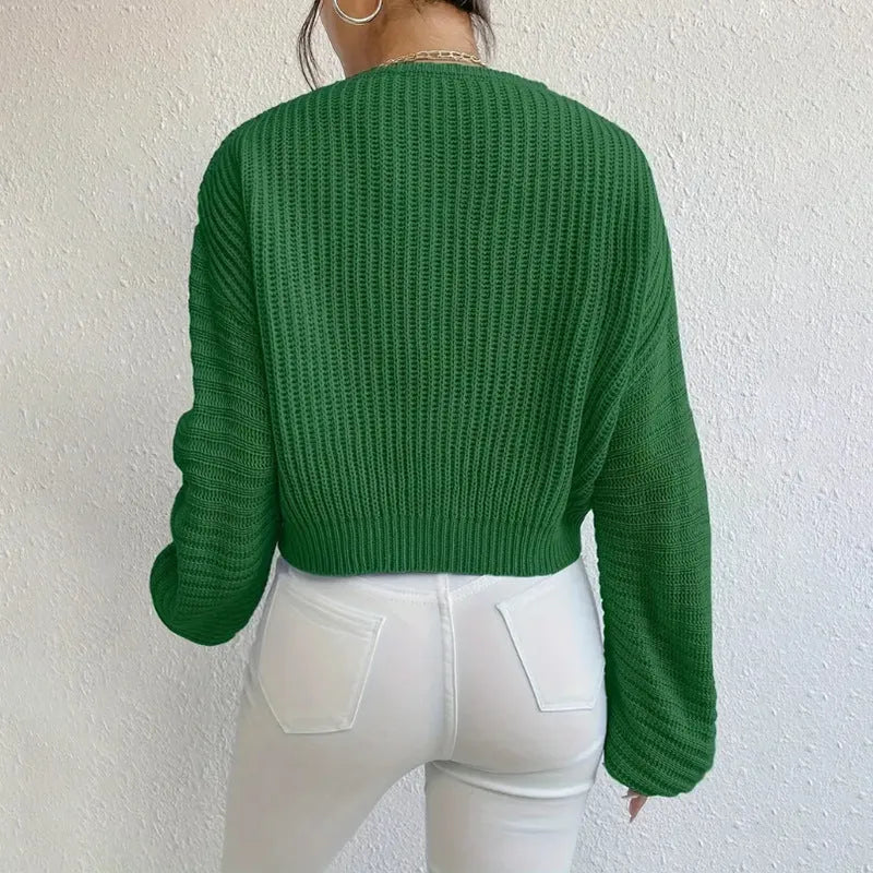 Women's solid colour long sleeve pullover top in a casual loose fit.