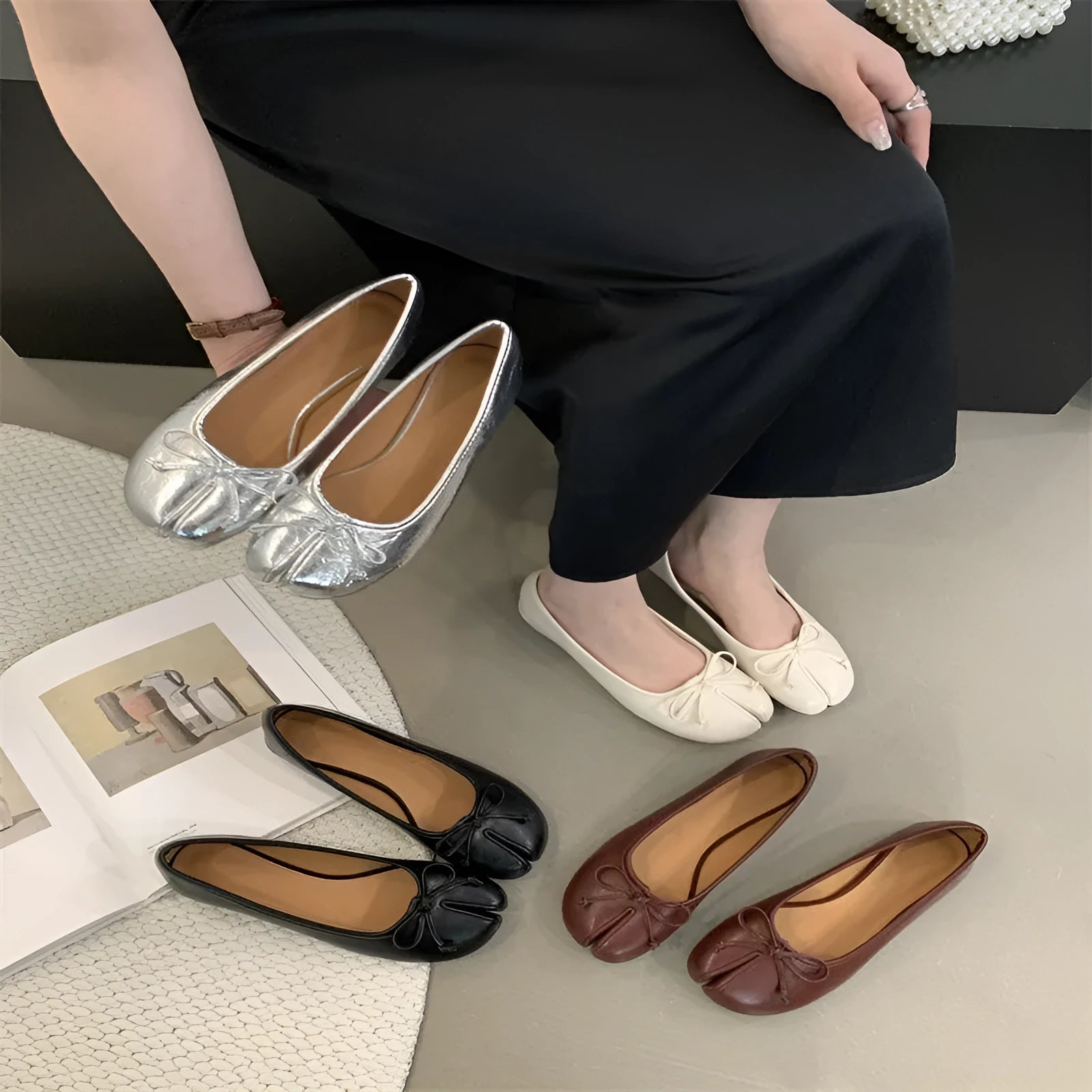 Women's flat pumps in beige with round toe and shallow-cut design on a rubber sole