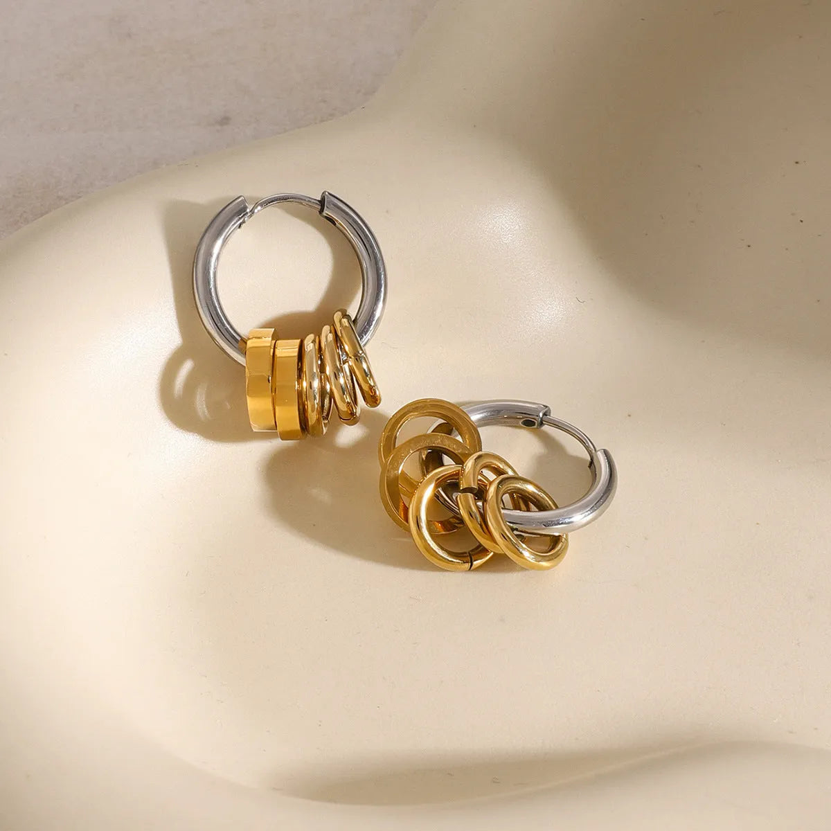 Stainless steel electroplated ins style earrings in gold or silver tone on a plain background.