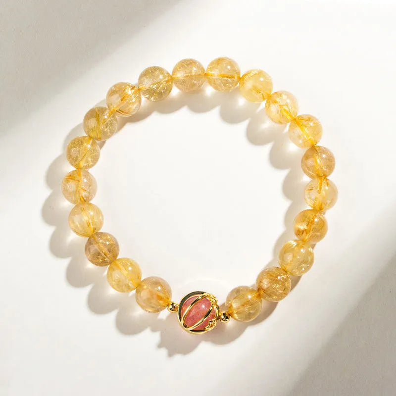 Gold rutilated quartz crystal bracelet with diamond shaped beads in Korean style design