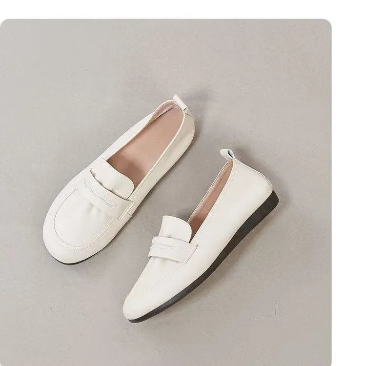 Women's slip-on flat loafers in beige white, black or apricot with low 1-3cm heel, PU upper and rubber sole