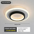 Black circular LED corridor light with aluminium and acrylic construction, 21cm diameter, for balcony or porch use