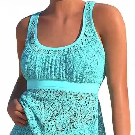 Women's conservative hollow design two-piece nylon swimsuit in a solid colour.