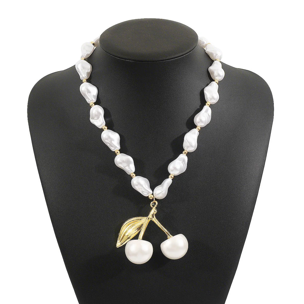 Women's adjustable geometric fruit pendant necklace on a pearl chain in gold or white K.