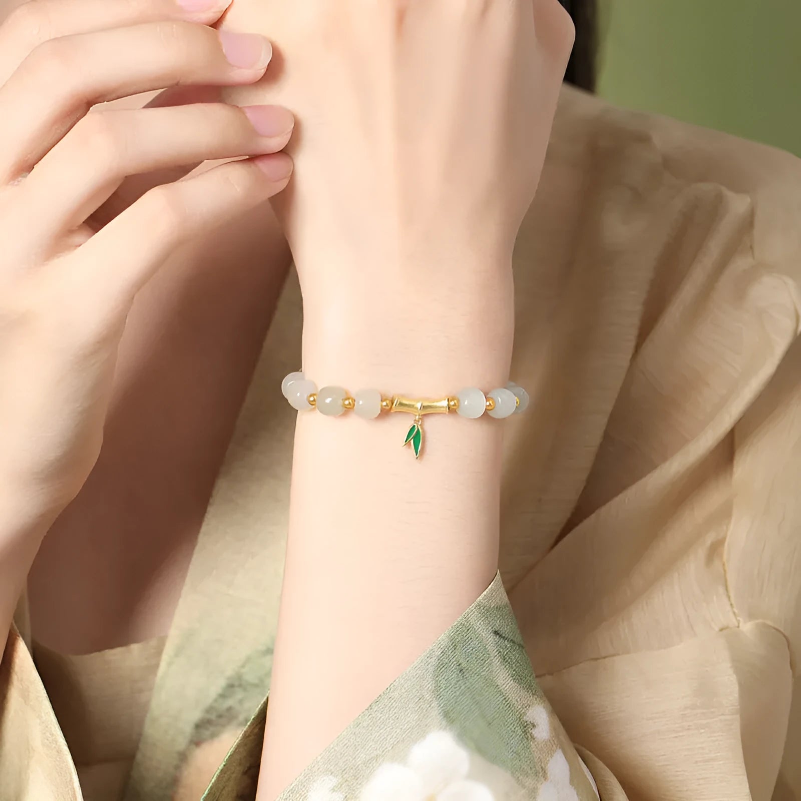Women's S925 sterling silver Hetian jade bracelet with bamboo leaf design and gold finish