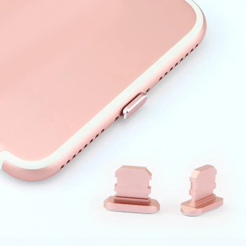 Aluminium alloy dust plug for iPhone charging port in various colours including gold and black.
