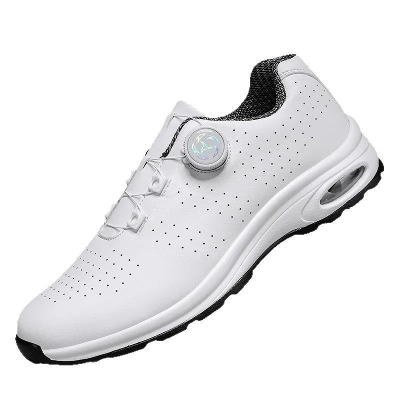 Low top black and white mesh casual shoes with cross shoulder straps and a composite sole.