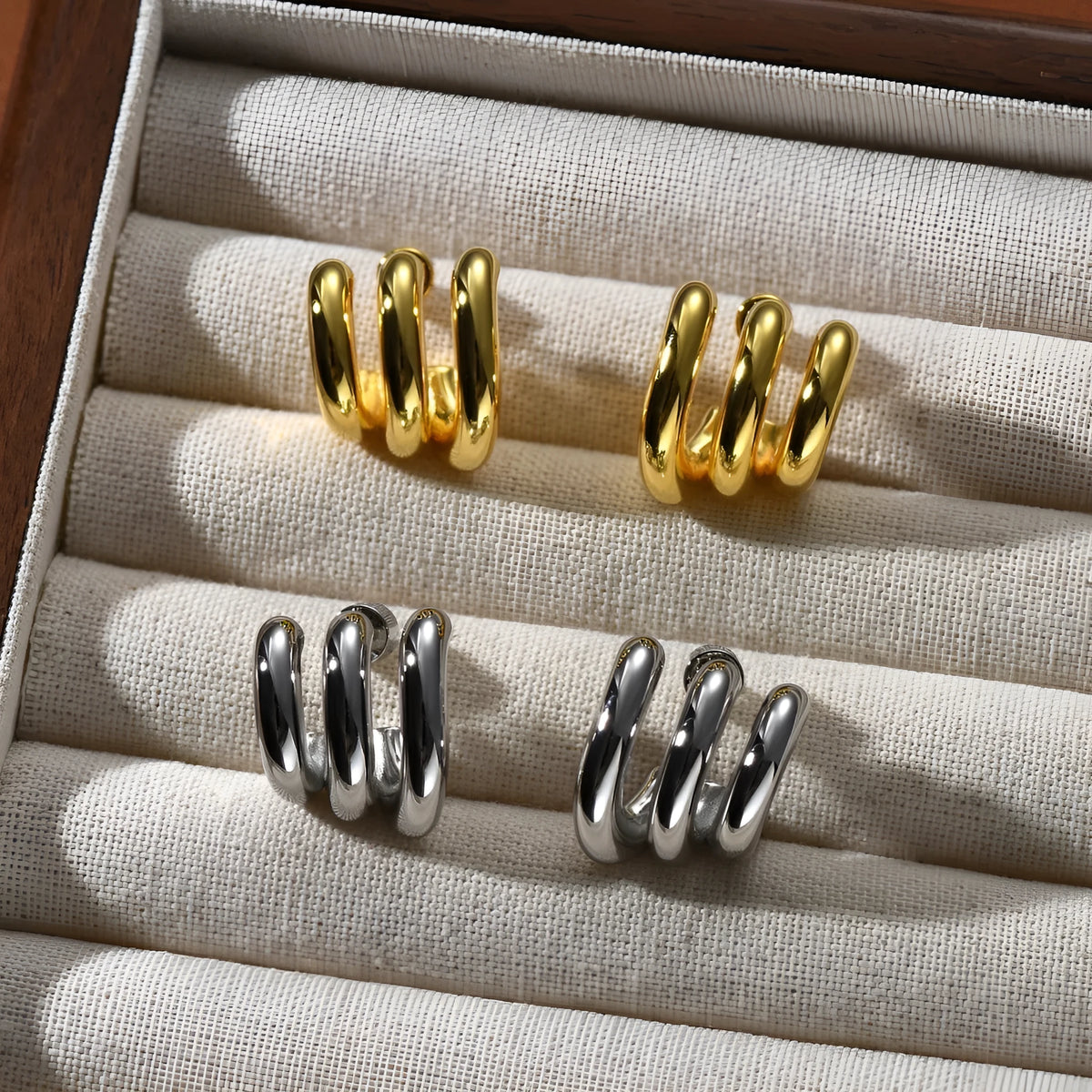 Pair of geometric ear studs for women with sterling silver needles and copper body in gold or silver