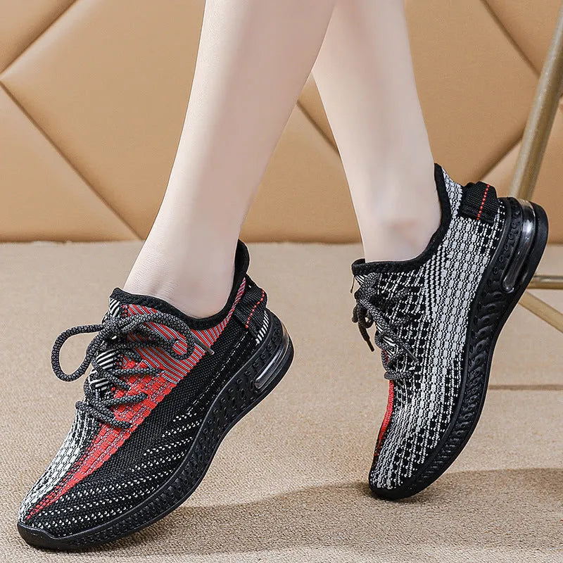 Women's purple casual lace-up running shoes with a round toe and flat plastic sole.