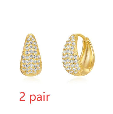Brass diamond earclip earrings with geometric round design and gold electroplated finish