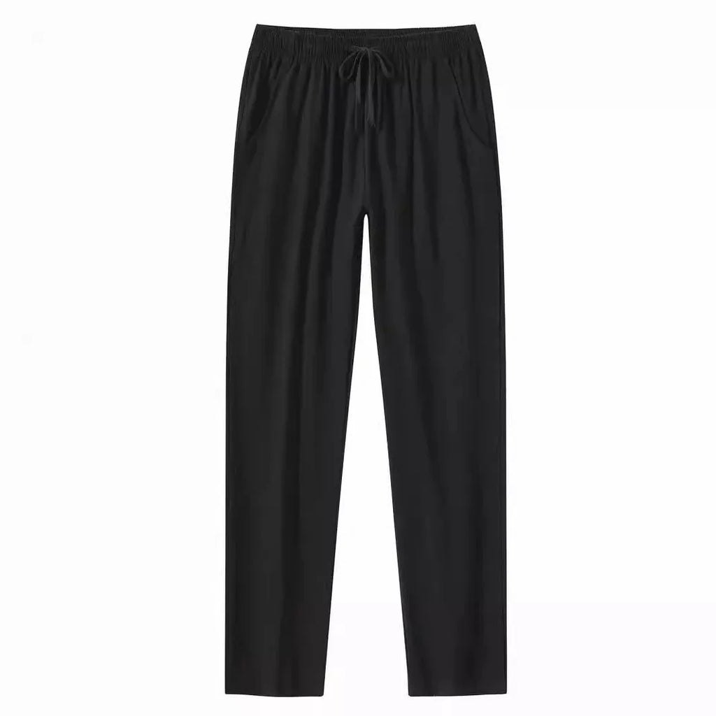 Men's cotton beach pants in loose casual fit showing solid colour options