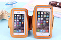 Waterproof running armband for iPhone 6, 7, 6s Plus and 7 Plus in neoprene with reflective material.
