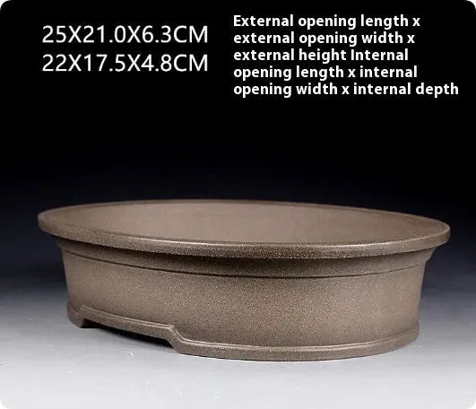 Handmade antique oval bonsai pot in purple sand clay measuring 25cm by 21cm