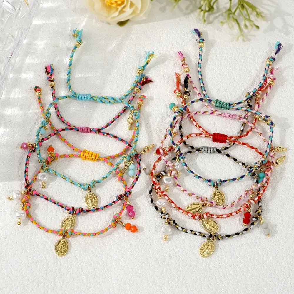 A colourful hand-woven braided rope bracelet in an ethnic strap style for women.