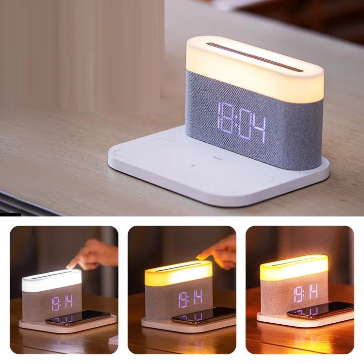 White or black table lamp with integrated wireless phone charger and digital clock display
