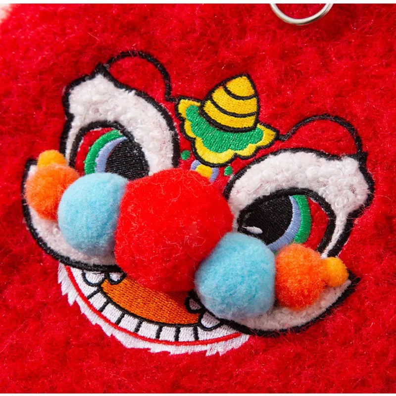 Red lion dance pet vest for cats and small dogs with 3D face, faux fur trim and leash ring.