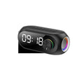 S8 Black portable mini speaker with USB charging cable on a table