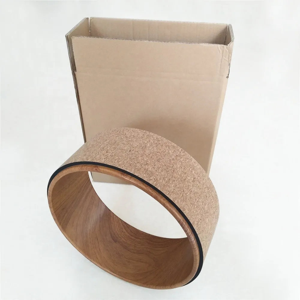 Back bending weight-bearing high yoga wooden yoga ring with cork surface on fitness mat