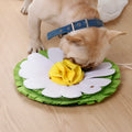 Plush dog sniffing pad toy in photo colour on a soft surface for bite play