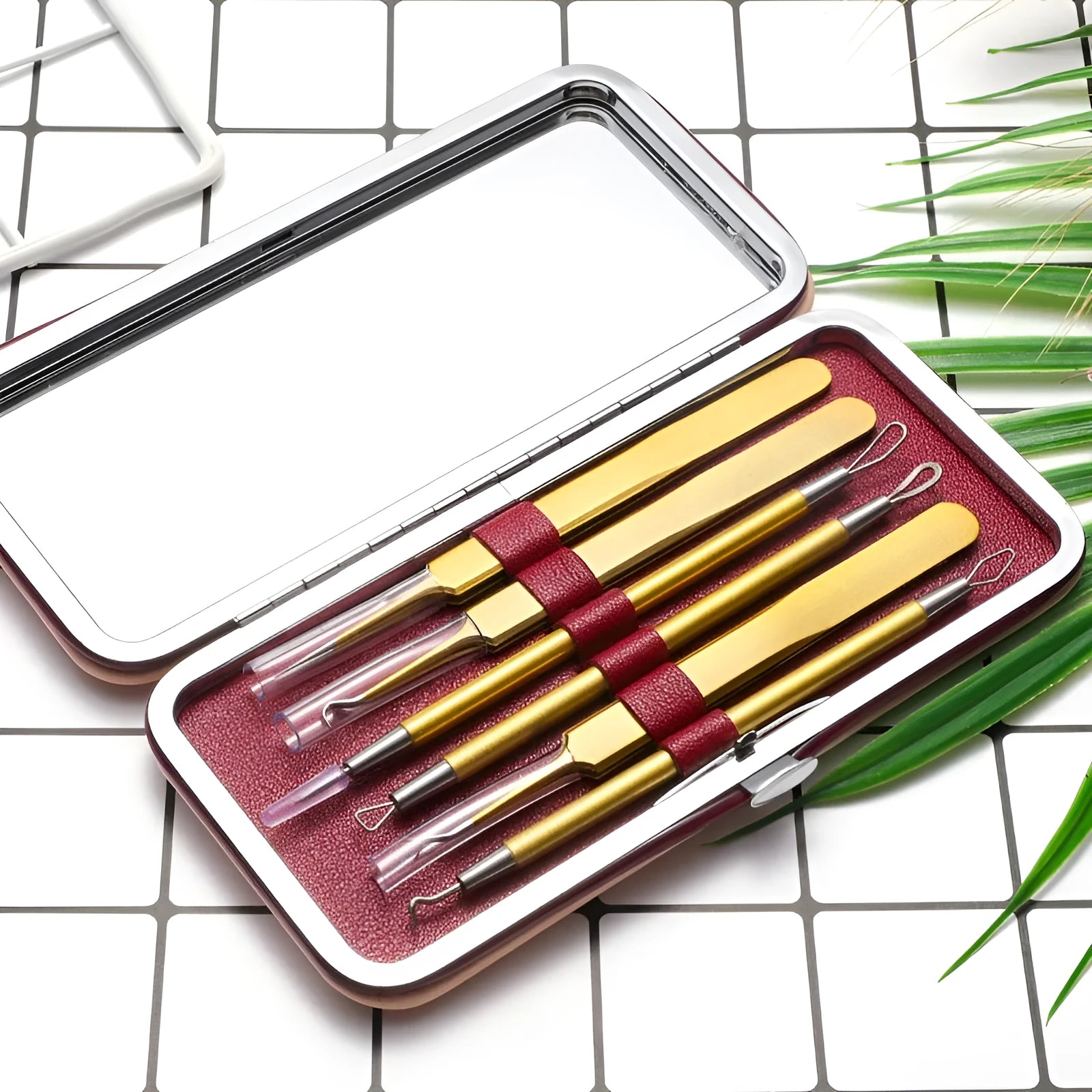 Six stainless steel acne remover tools with rose gold finish for professional pimple extraction