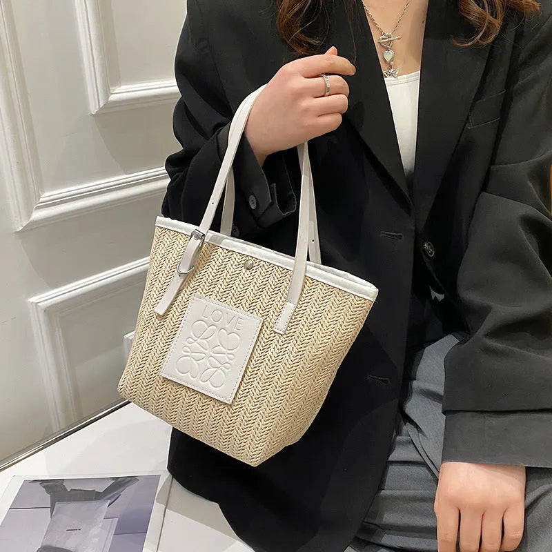 Straw woven women's shoulder bag with horizontal square shape and three-dimensional pocket