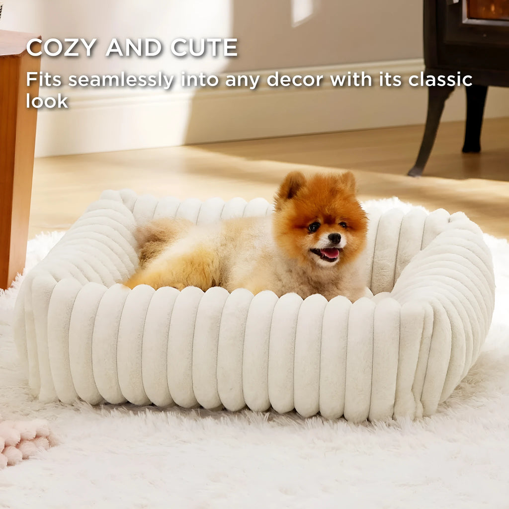 Soft winter dog bed cushion in beige colour showing raised sides and plush sleeping surface