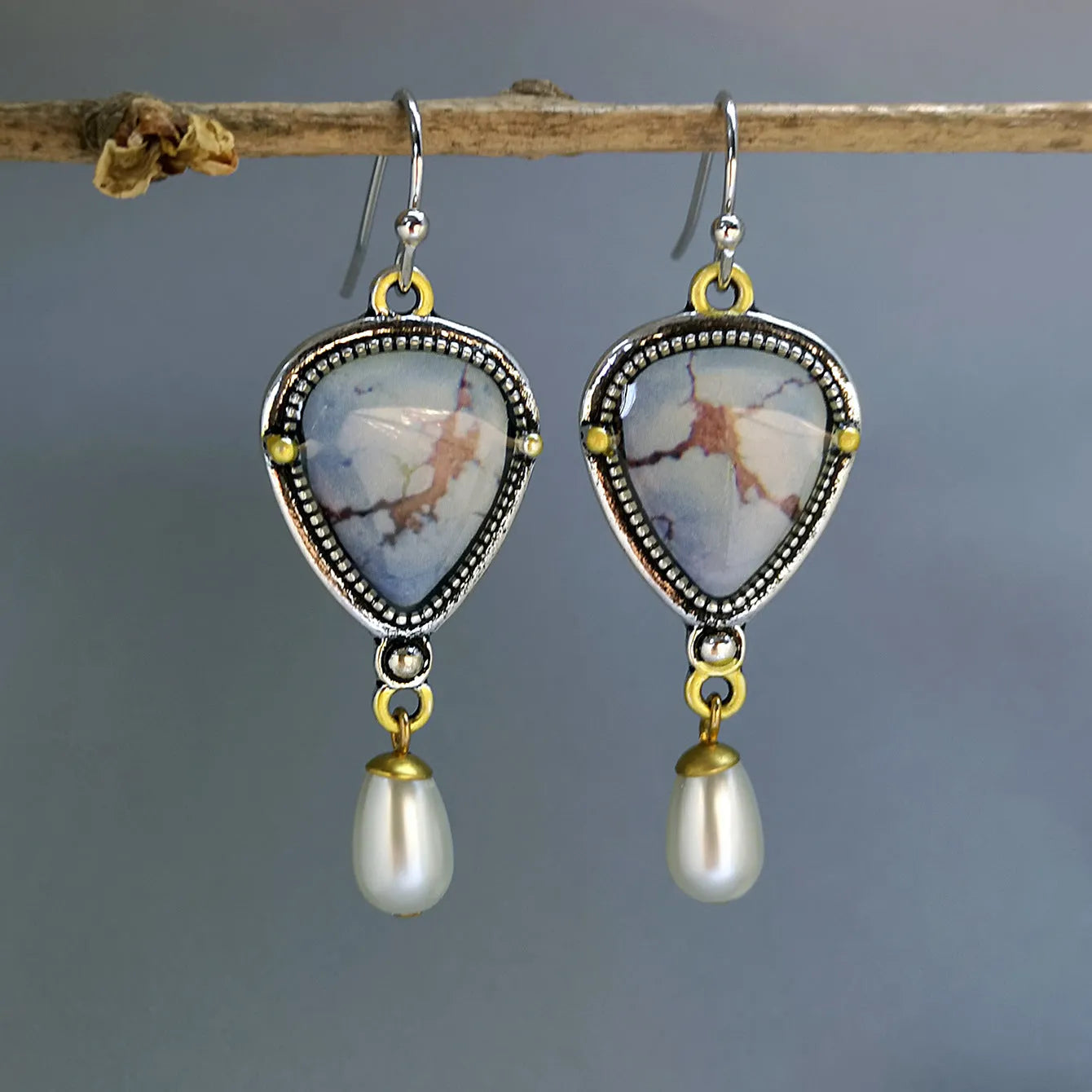 Retro blue drop earrings with electroplated metal, synthetic blue opal, and white pearl components