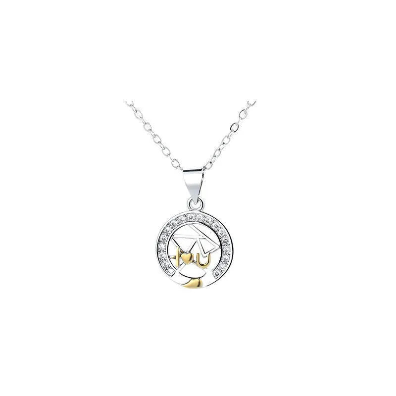Copper sun and moon couple necklace with electroplated finish and cross chain.