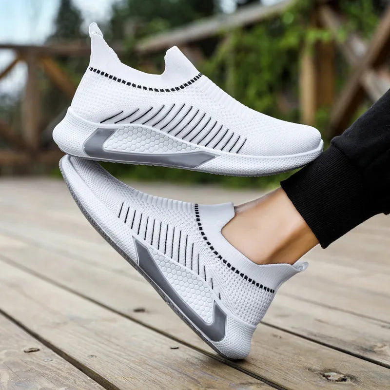 Men's mesh slip-on sneakers with striped design and breathable flyknit upper in black colour