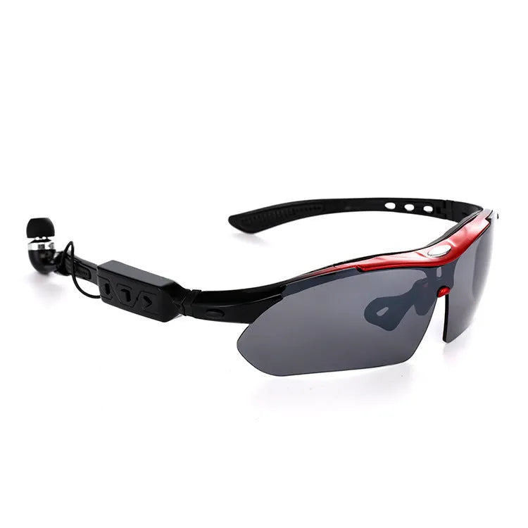 Stereo Bluetooth glasses headset with polarised gray lenses in black frame on white background