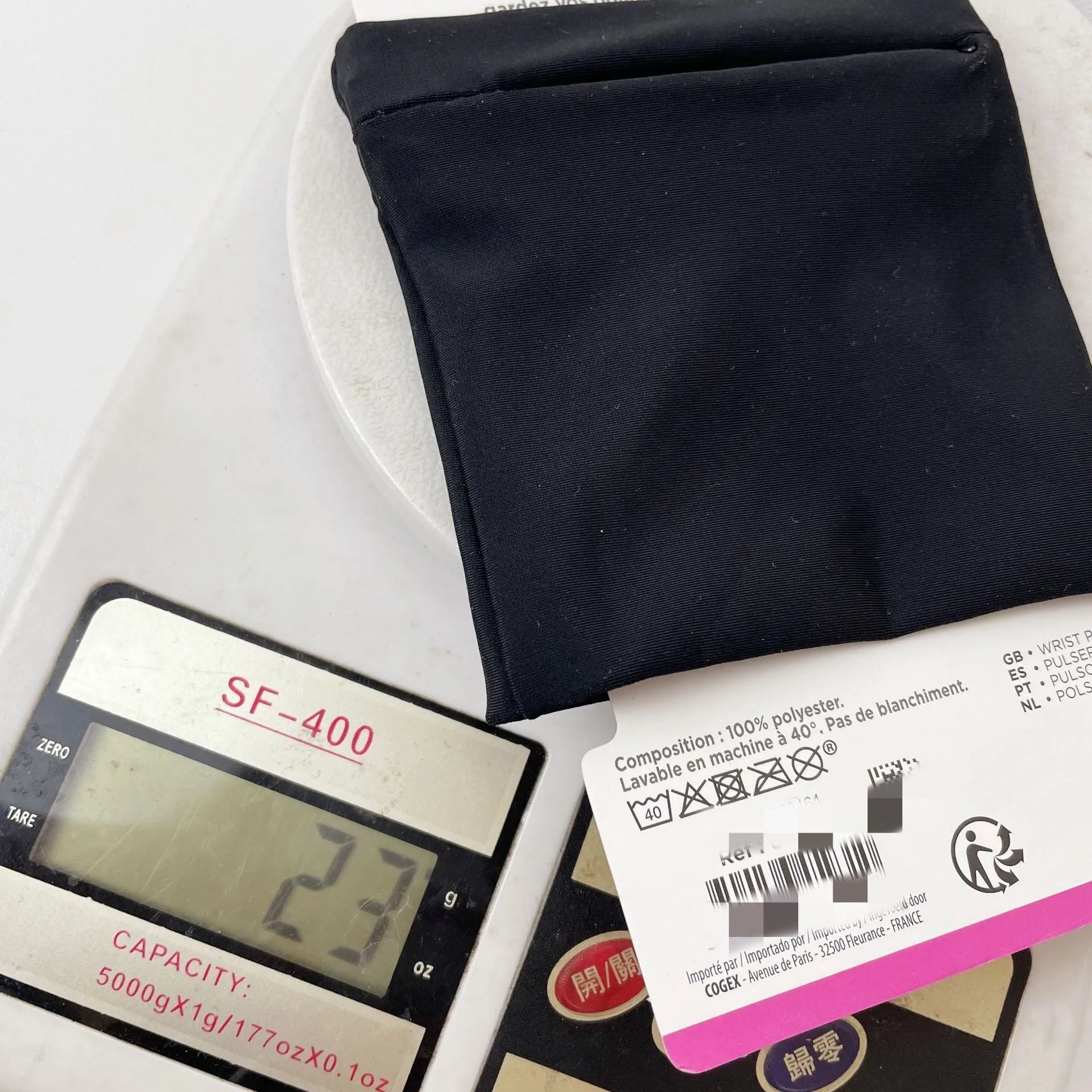 Compact 10 by 10.5cm wrist-worn armband sleeve for carrying a mobile phone.